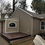 Akron home restoration after water and fire damage with new siding and trim