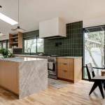 A mid-century kitchen refers to a kitchen design style that was popular during the mid-20th century, typically between the 1940s and 1960s. This style embraces a retro and nostalgic feel, with clean lines, bold colors, and a focus on functionality.