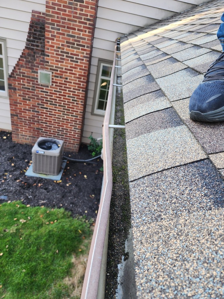 Professional Gutter Cleaning by General Contractor in Akron
