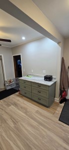 Kitchen remodel with fresh paint, recessed lighting, and central island cabinetry