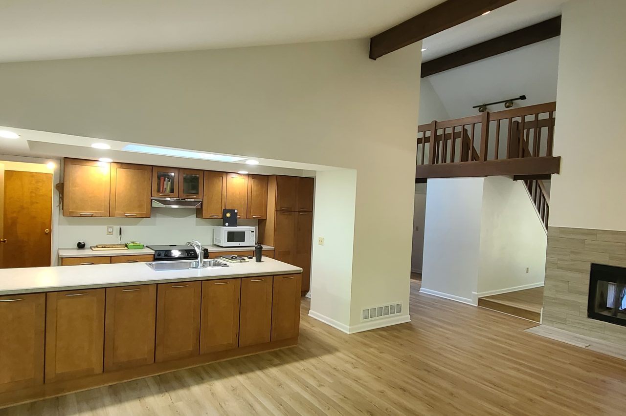 Interior view of home with structural beam repair and drywall patching in Akron